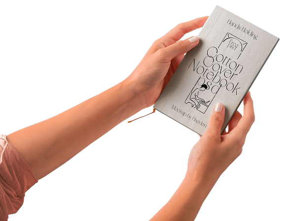 Hands holding a notebook